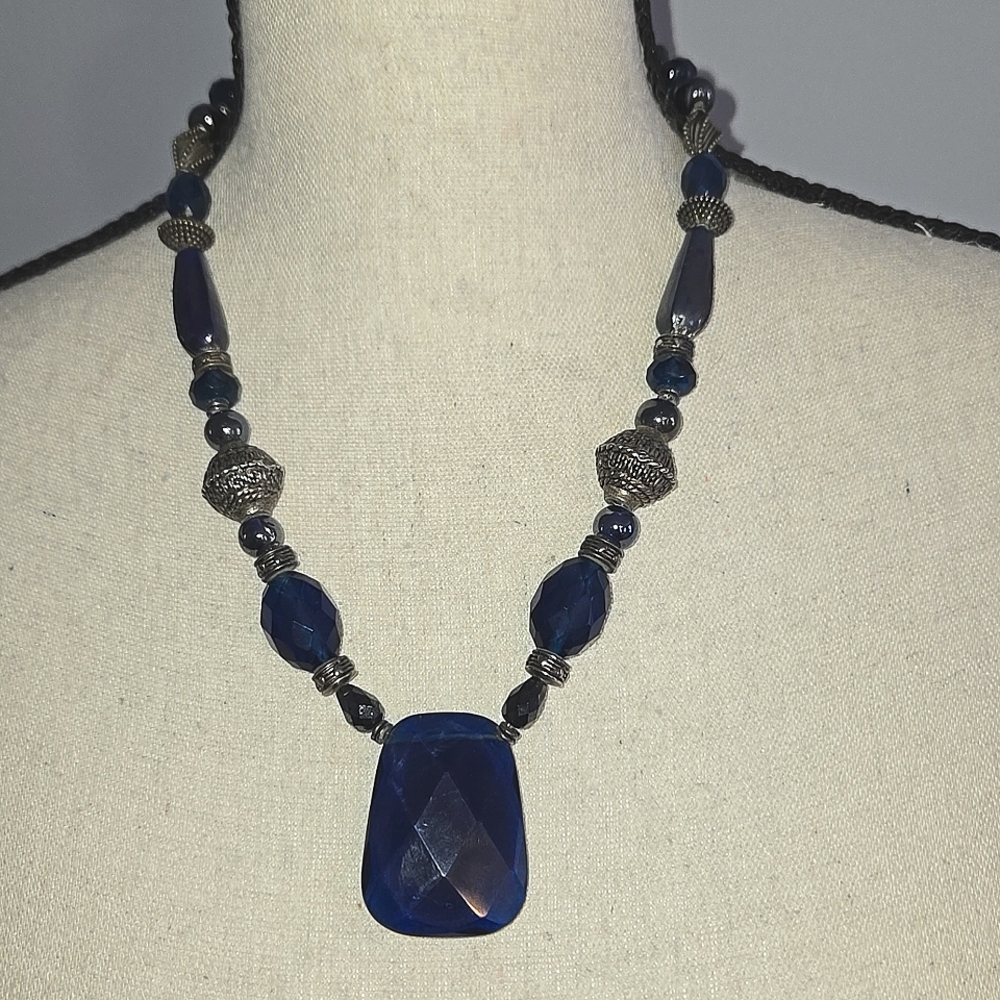Necklace with large blue bead
